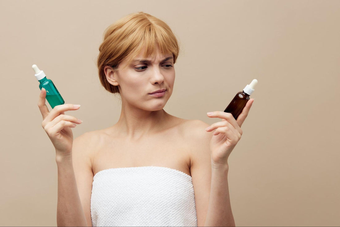 A woman holding two bottles of skin care products, showcasing her interest in beauty and personal care